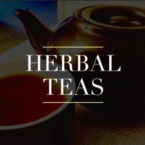 Tea Pot and cup of herbal tea